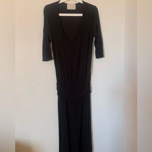 Black long sleeved dress. Adjustable waist height